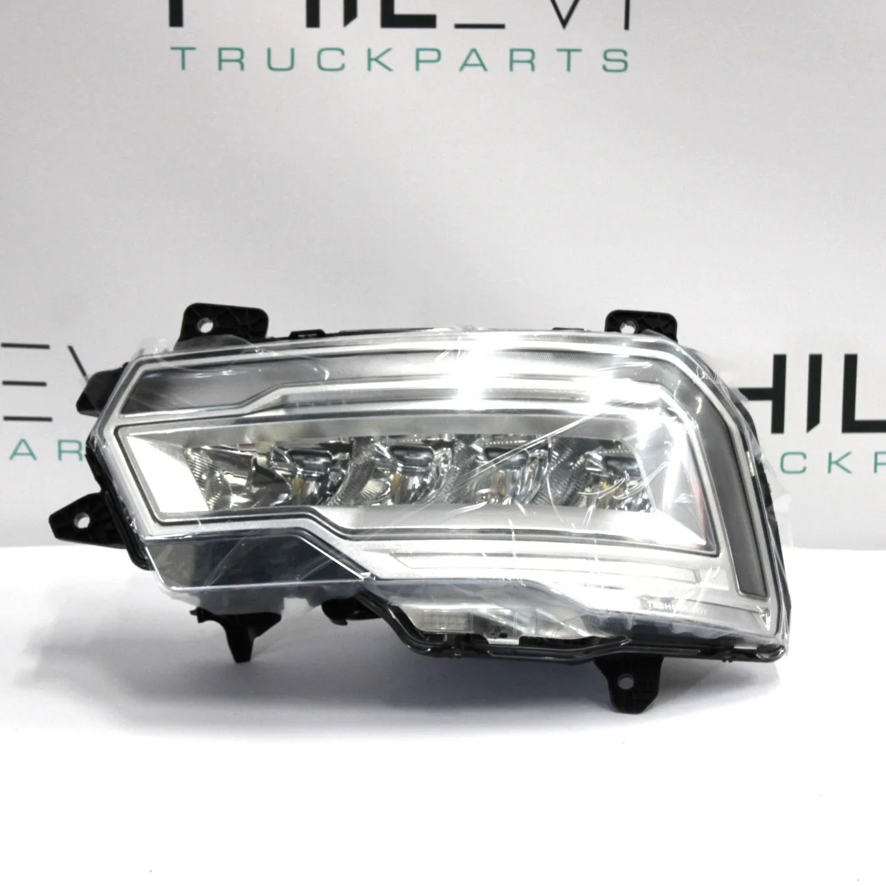 Headlamp left DAF XG 2425984
